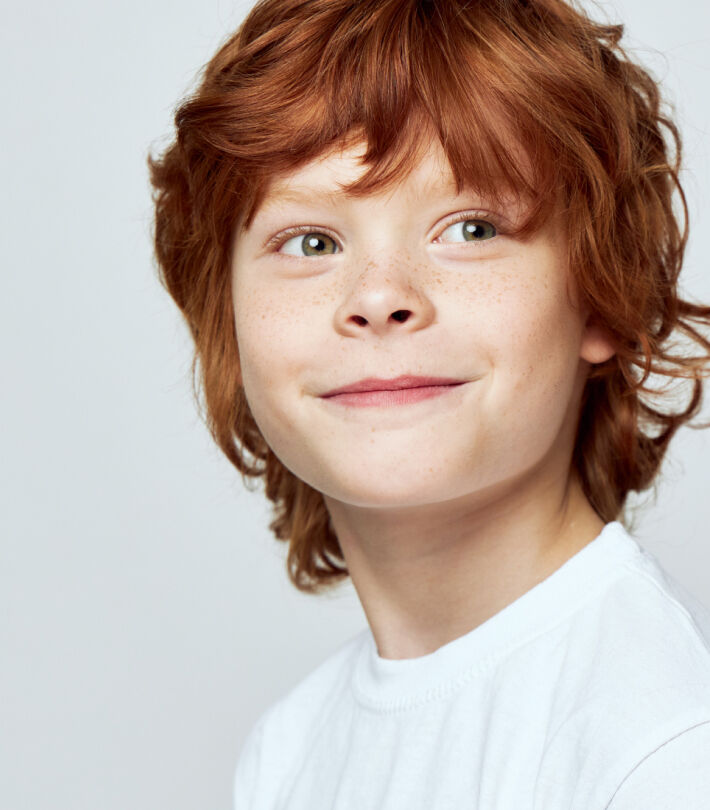 Playful child smiling, representing children&rsquo;s eye health