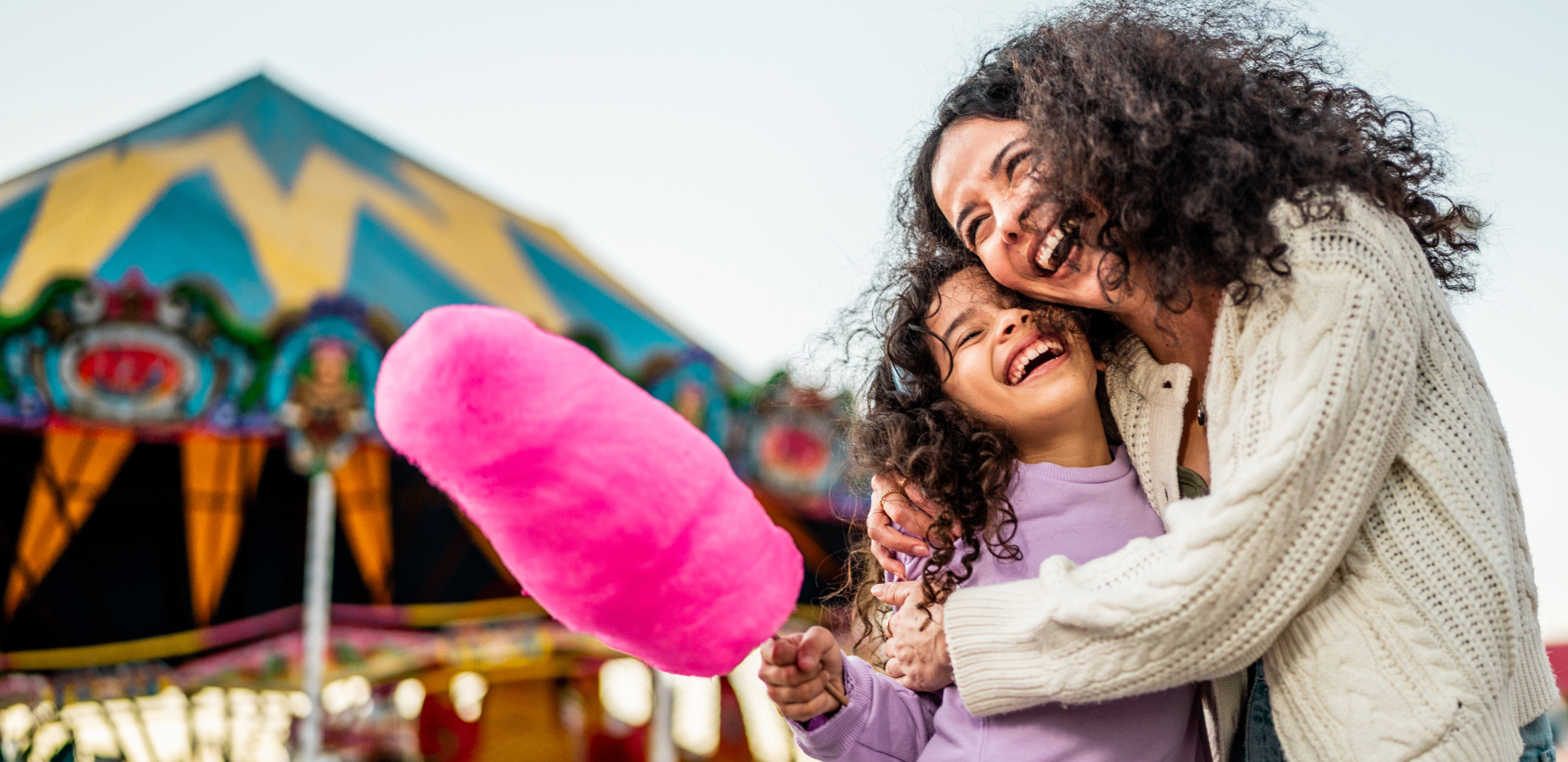 Mother and daughter enjoying clear vision moments after an advanced eye test.